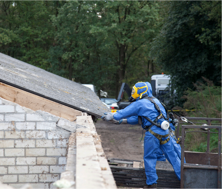 Puget Sound Abatement employees working on a roof